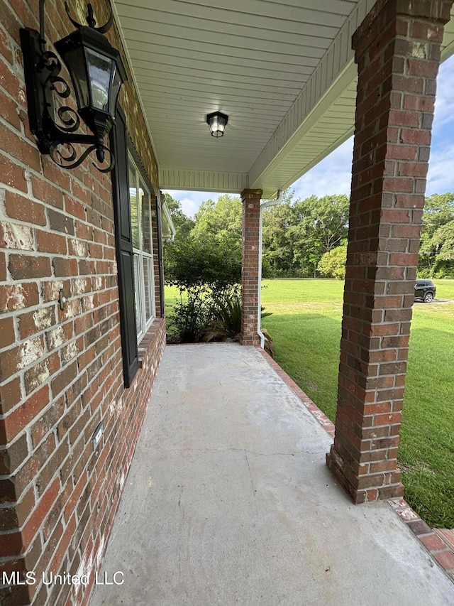 8 Jennie Ln, Picayune, MS 39466 - covered porch featuring a lawn