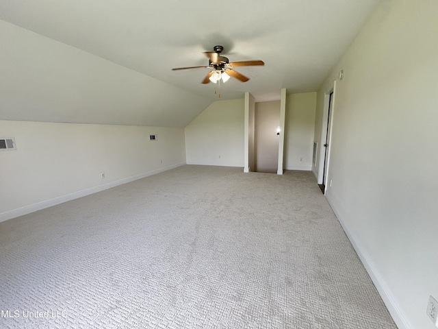 8 Jennie Ln, Picayune, MS 39466 - additional living space featuring ceiling fan, light carpet, lofted ceiling, and baseboards