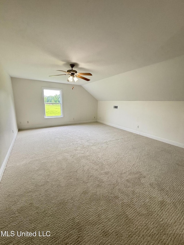 8 Jennie Ln, Picayune, MS 39466 - bonus room with vaulted ceiling, carpet floors, a ceiling fan, and baseboards