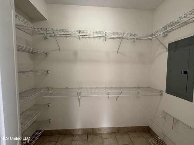 8 Jennie Ln, Picayune, MS 39466 - walk in closet featuring electric panel and tile patterned flooring