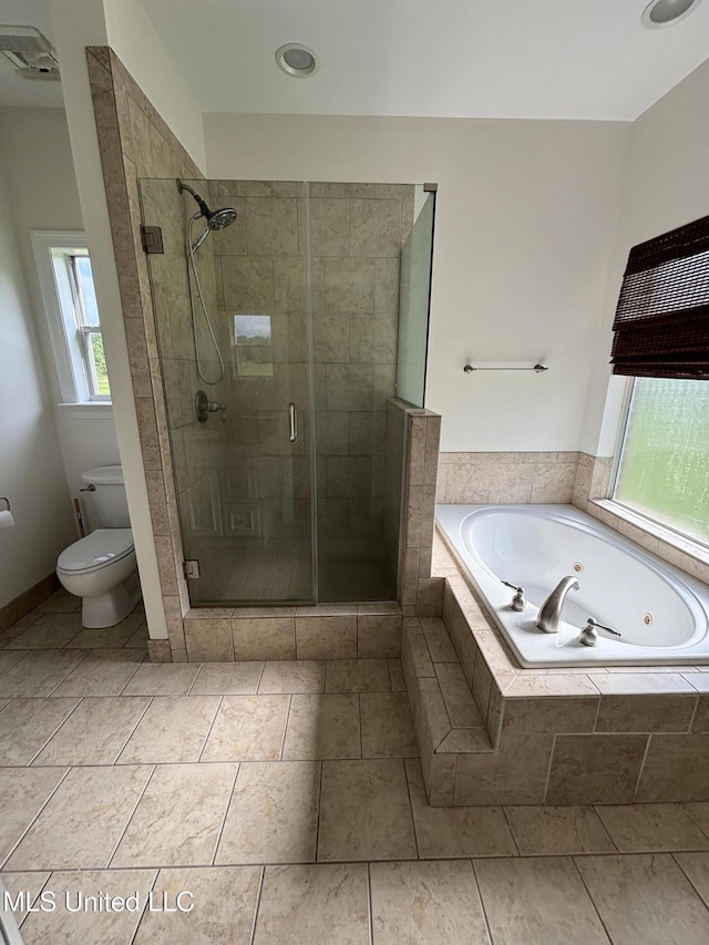8 Jennie Ln, Picayune, MS 39466 - bathroom featuring a jetted tub, toilet, and a stall shower