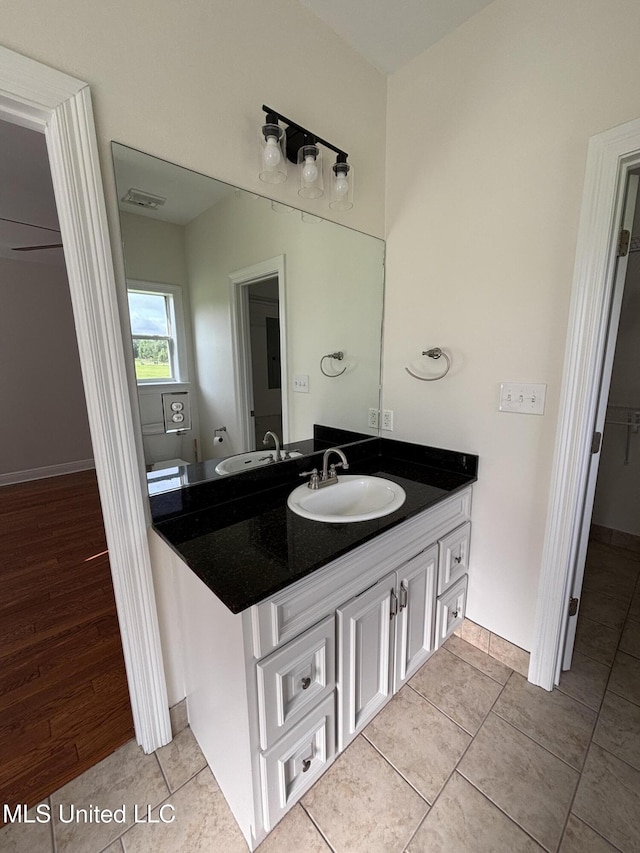 8 Jennie Ln, Picayune, MS 39466 - bathroom with vanity, tile patterned flooring, and baseboards