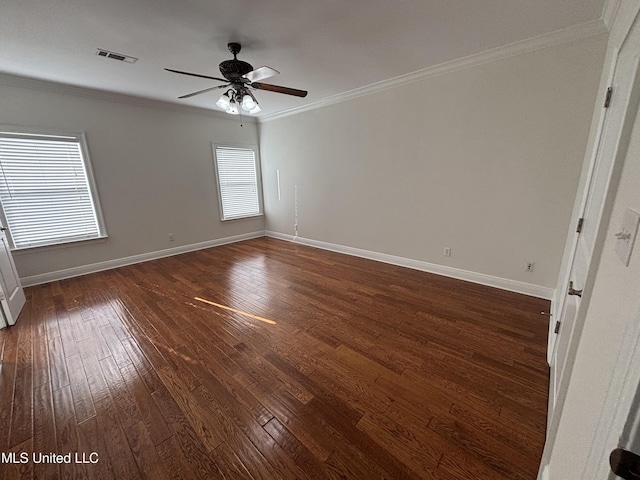 8 Jennie Ln, Picayune, MS 39466 - spare room with dark wood-type flooring, crown molding, ceiling fan, and baseboards