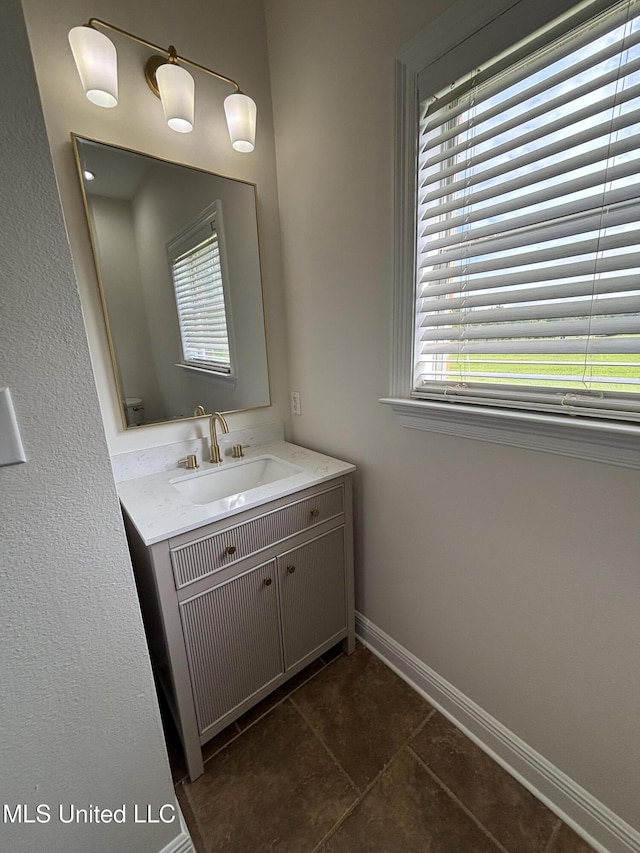 8 Jennie Ln, Picayune, MS 39466 - bathroom featuring vanity, baseboards, and tile patterned floors