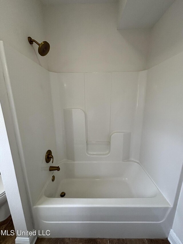 8 Jennie Ln, Picayune, MS 39466 - bathroom featuring shower / bathtub combination and toilet