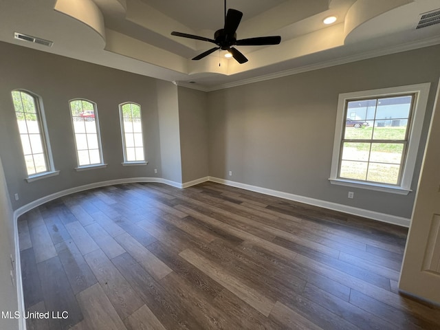145 Poplar Ln, Holly Springs, MS 38635 - unfurnished room with a raised ceiling, crown molding, dark wood-style flooring, baseboards, and ceiling fan