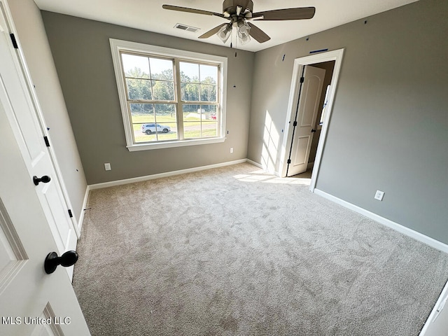 interior space featuring ceiling fan