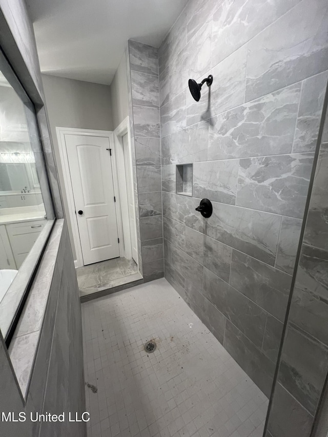 145 Poplar Ln, Holly Springs, MS 38635 - full bathroom with a tile shower