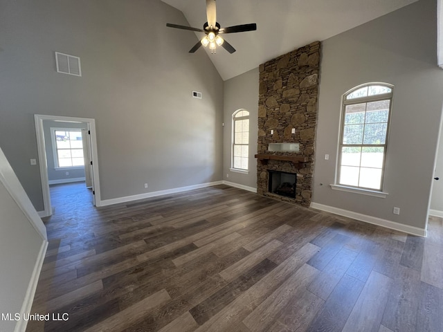 145 Poplar Ln, Holly Springs, MS 38635 - unfurnished living room featuring high vaulted ceiling, ceiling fan, dark wood-type flooring, baseboards, and a fireplace