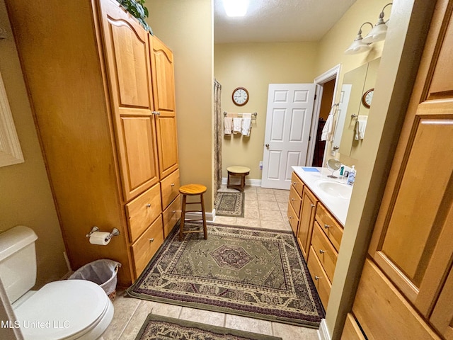 8855 Pine Springs Rd, Meridian, MS 39305 - full bathroom with vanity, a shower stall, toilet, baseboards, and tile patterned flooring