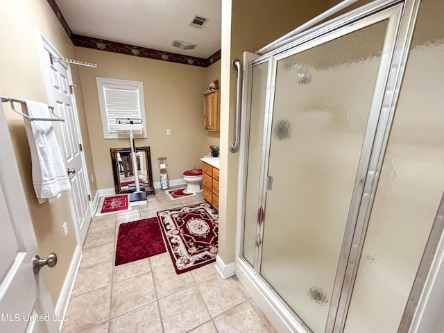 8855 Pine Springs Rd, Meridian, MS 39305 - full bathroom with vanity, a stall shower, tile patterned flooring, and baseboards