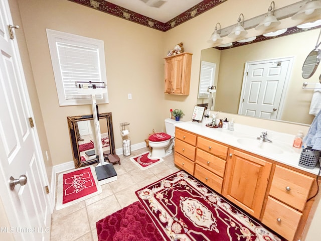 8855 Pine Springs Rd, Meridian, MS 39305 - bathroom featuring vanity, tile patterned floors, toilet, and baseboards