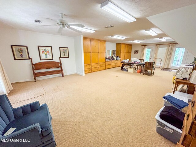 8855 Pine Springs Rd, Meridian, MS 39305 - interior space with light carpet, a ceiling fan, and baseboards