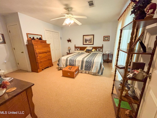 8855 Pine Springs Rd, Meridian, MS 39305 - bedroom featuring light colored carpet, a closet, a ceiling fan, and baseboards