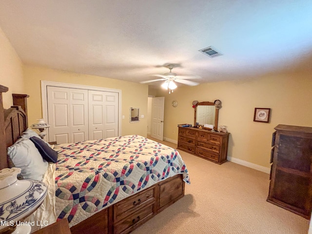 8855 Pine Springs Rd, Meridian, MS 39305 - bedroom with a closet, light carpet, a ceiling fan, and baseboards