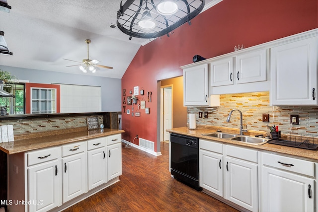 kitchen with black dishwasher, sink, and white cabinetry