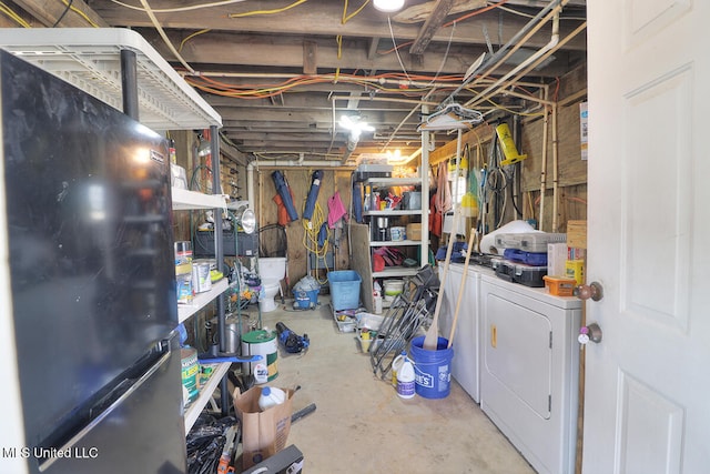 basement featuring washer and clothes dryer