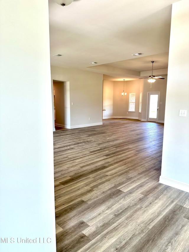 spare room with hardwood / wood-style floors and ceiling fan