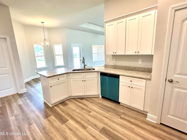 kitchen featuring dishwasher, kitchen peninsula, sink, and light hardwood / wood-style flooring