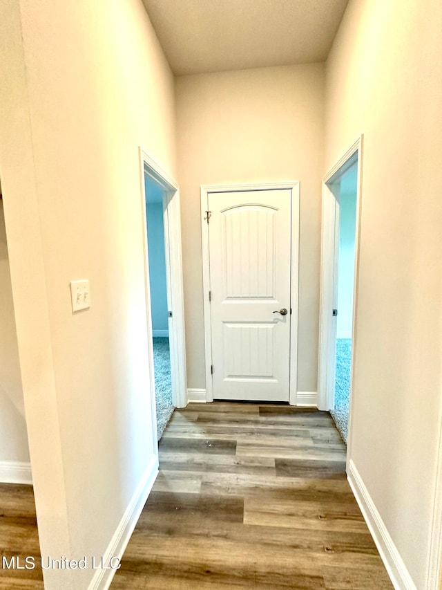 hallway featuring hardwood / wood-style floors