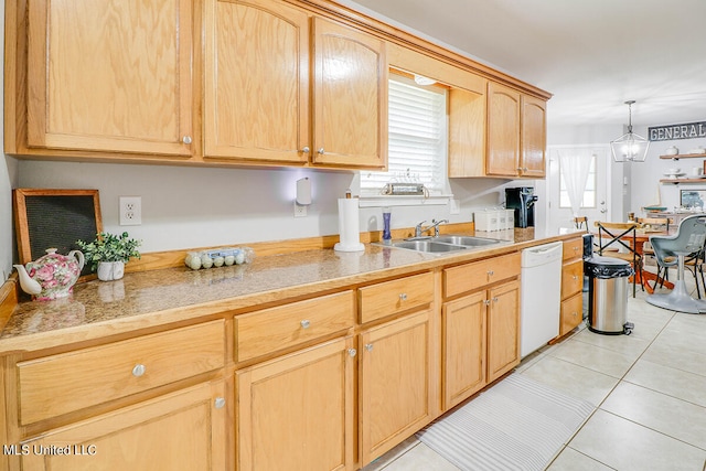 kitchen featuring light brown cabinetry, sink, light tile patterned flooring, dishwasher, and pendant lighting