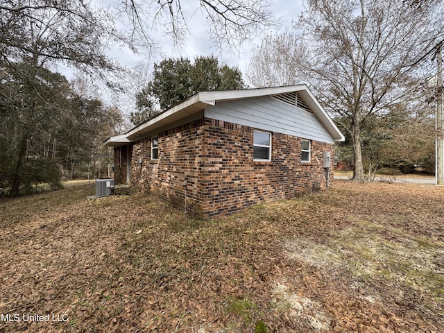 view of home's exterior featuring cooling unit