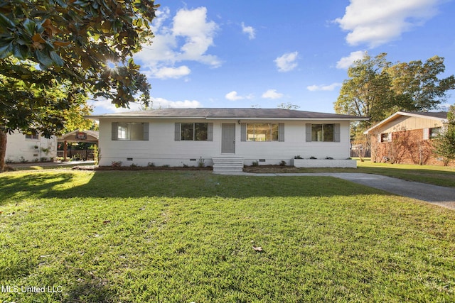 ranch-style home with a front yard