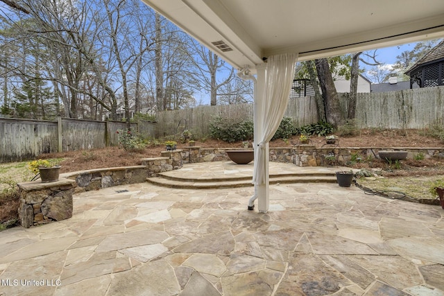 view of patio / terrace featuring a fenced backyard