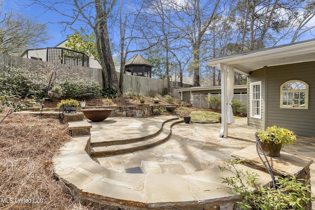 view of patio / terrace with fence