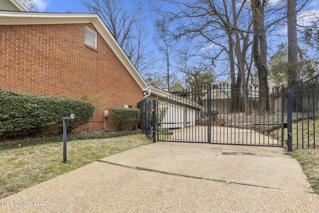 view of gate with fence