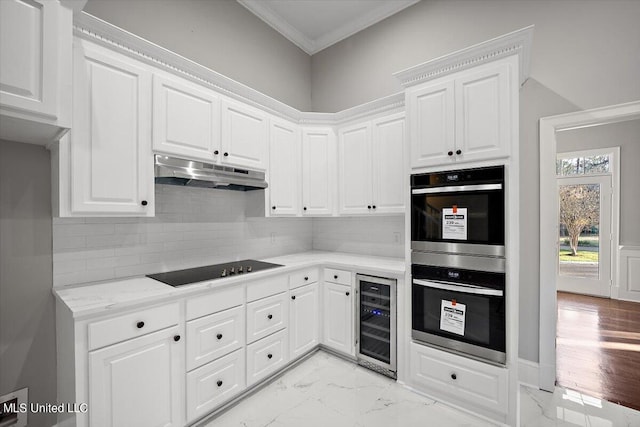 kitchen featuring white cabinetry, black electric cooktop, wine cooler, and double oven