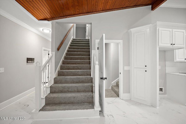 stairway with wood ceiling, ornamental molding, and lofted ceiling