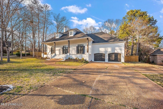 view of front of property with a front yard and covered porch