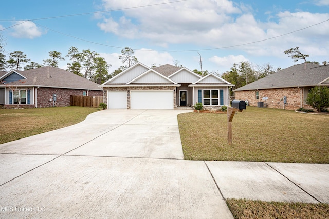 view of front of property with cooling unit, a front yard, and a garage