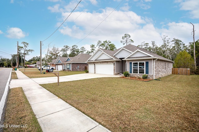 view of front facade featuring a garage and a front lawn