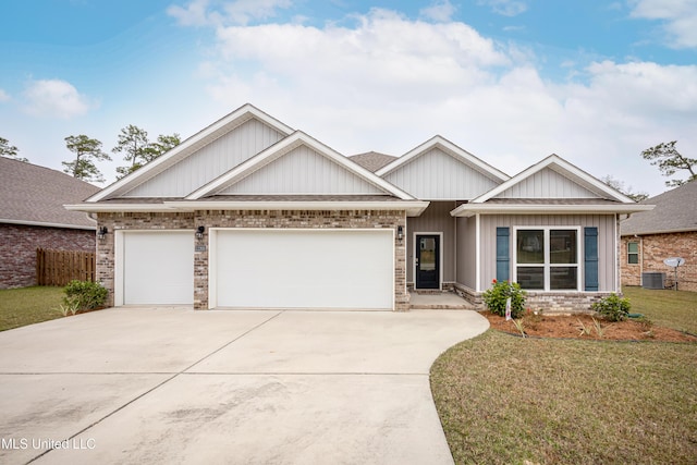 craftsman-style house with a garage and a front lawn