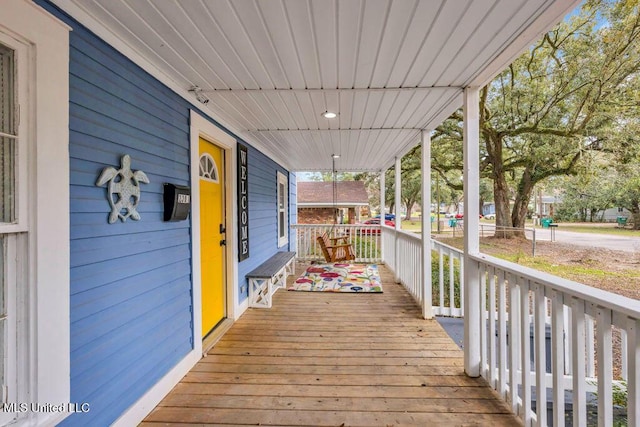 deck featuring covered porch