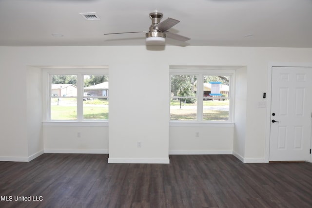 interior space featuring dark hardwood / wood-style floors, plenty of natural light, and ceiling fan