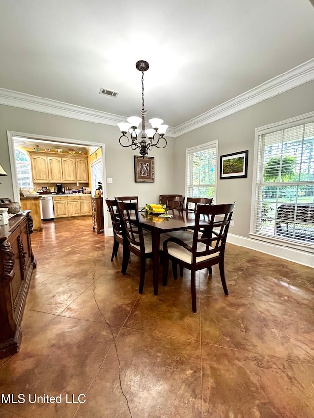 6520 Pleasant Grove Rd, Carthage, MS 39051 - dining space with crown molding and a chandelier