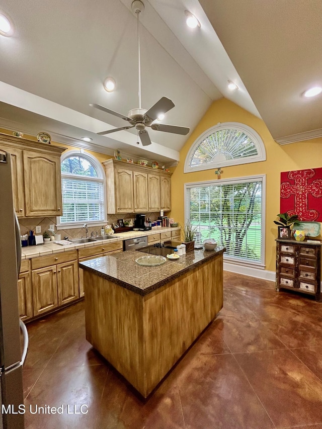 6520 Pleasant Grove Rd, Carthage, MS 39051 - kitchen with freestanding refrigerator, a kitchen island, vaulted ceiling, a ceiling fan, and dishwasher