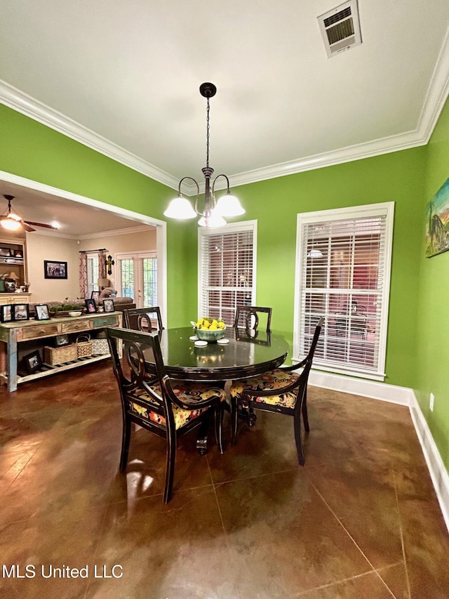 6520 Pleasant Grove Rd, Carthage, MS 39051 - dining room featuring crown molding and a chandelier