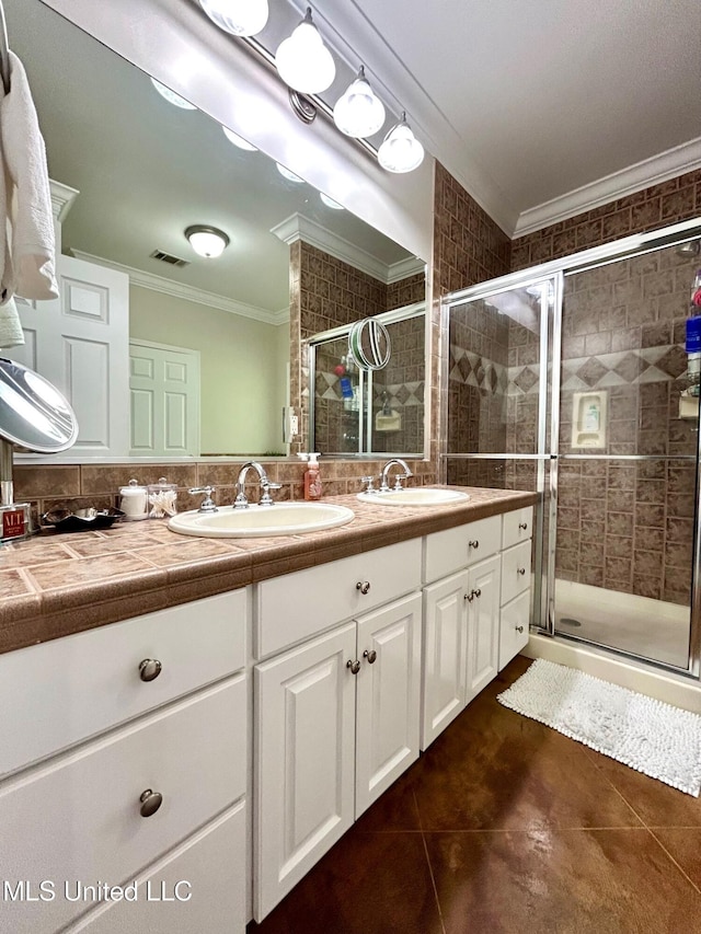 6520 Pleasant Grove Rd, Carthage, MS 39051 - full bath with ornamental molding, tile patterned flooring, double vanity, and a stall shower