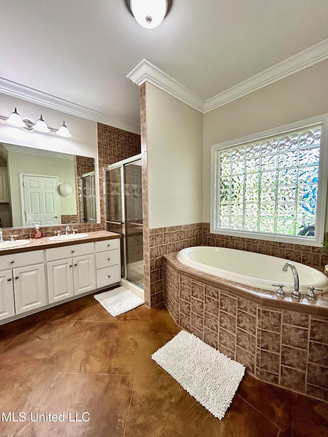 6520 Pleasant Grove Rd, Carthage, MS 39051 - bathroom with vanity, a garden tub, crown molding, a stall shower, and tile patterned floors