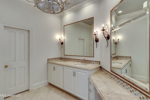 bathroom featuring double vanity, tile patterned floors, baseboards, a chandelier, and recessed lighting
