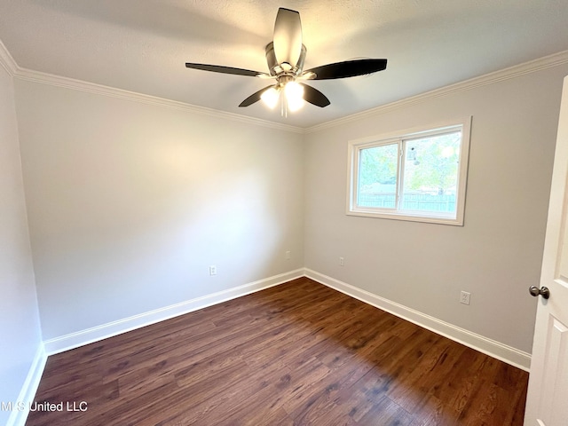 unfurnished room featuring ceiling fan, crown molding, and dark wood-type flooring