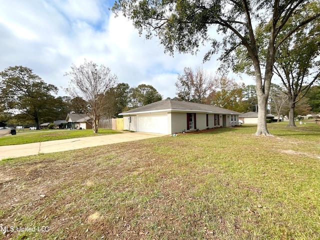 ranch-style house with a front yard and a garage