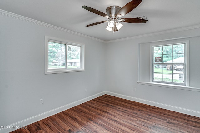 empty room with crown molding, dark hardwood / wood-style flooring, and ceiling fan