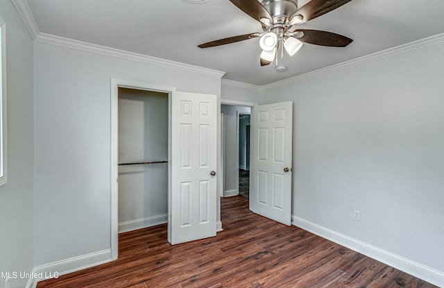 unfurnished bedroom featuring a closet, dark hardwood / wood-style floors, ceiling fan, and ornamental molding