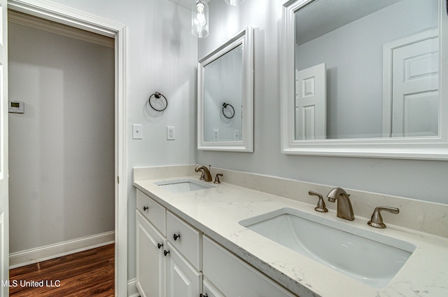 bathroom featuring vanity and wood-type flooring