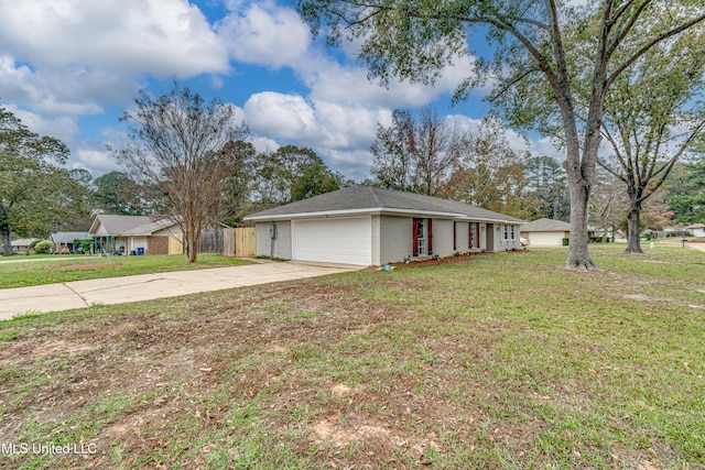 single story home featuring a garage and a front lawn